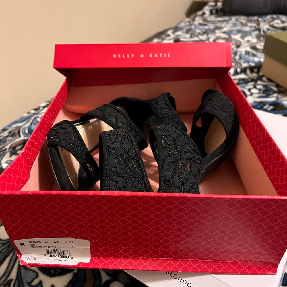 Kelly & Katie Amari black lace shoes.